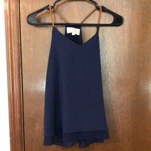 ⭐️ 3/$12 ⭐️ starred items only! 
Sweet wanderer navy blue tank top. Size small.